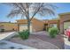 Front of house with driveway and desert landscaping at 2535 Sierra Sage St, Las Vegas, NV 89134