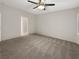 Large bedroom with ceiling fan and carpet flooring at 2653 Rue Montpellier Ave, Henderson, NV 89044