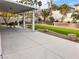 Covered patio, artificial turf, and a spacious backyard at 3049 Azure Bay St, Las Vegas, NV 89117