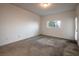 Well-lit bedroom featuring a window and neutral carpeting at 3550 Bay Sands Dr # 2076, Laughlin, NV 89029