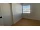 Well-lit bedroom with hardwood floors and ample closet space at 4257 Ridgedale Ave, Las Vegas, NV 89121