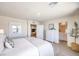 Main bedroom with king bed and en-suite bathroom at 5021 Apple Mesa Ave # Lot 222, Las Vegas, NV 89139