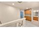 Upstairs bathroom with a shower and wood cabinets at 5183 Zoroaster St, Las Vegas, NV 89148