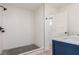 Modern bathroom with a walk-in shower and patterned tile at 7392 Laredo St, Las Vegas, NV 89117