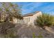 House exterior with solar panels and desert landscaping at 7927 Crested Starling Ct, North Las Vegas, NV 89084