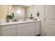 Modern bathroom with white cabinets and quartz countertop at 9380 Serene Harbor St # Lot 27, Las Vegas, NV 89178