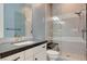 Modern bathroom with a large walk-in shower and gray tile at 5 Porto Malaga St, Henderson, NV 89011