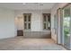 Elegant dining area with built-in hutch and access to the backyard at 5 Porto Malaga St, Henderson, NV 89011