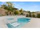 Luxury backyard oasis with a large pool, spa, and plenty of lounge space at 12135 Castilla Rain Ave, Las Vegas, NV 89138