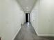 Bright hallway with tile floors and neutral walls at 1417 Winwood St, Las Vegas, NV 89108