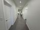 Clean and bright hallway with access to rooms at 1417 Winwood St, Las Vegas, NV 89108