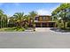 Beautiful two-story home with a three-car garage and lush landscaping at 1504 Castle Wall St, Las Vegas, NV 89117