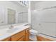 Clean bathroom with shower/tub combo, vanity, and toilet at 1805 Walking Path Ave, Henderson, NV 89012