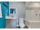 Modern bathroom with a teal feature wall at 1816 Saylor Way, Las Vegas, NV 89108