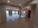 Bright and airy entryway with tile floors and views to the living room at 40 Luce Del Sole # 1, Henderson, NV 89011