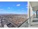 Balcony with glass railings and views of the city below at 4381 W Flamingo Rd # 5201, Las Vegas, NV 89103