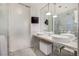 Modern bathroom with double sinks and marble finishes at 4381 W Flamingo Rd # 5201, Las Vegas, NV 89103