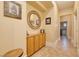 Bright hallway with built-in storage and access to laundry room at 448 Punto Vallata Dr, Henderson, NV 89011