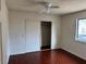 Bedroom with hardwood floors and sliding door closet at 5576 W Rochelle Ave # 40D, Las Vegas, NV 89103