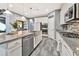 Spacious kitchen with stainless steel appliances and granite countertops at 5633 Silver Cascade Ave, Las Vegas, NV 89131