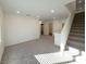 Bright and airy loft with grey carpet and staircase access at 5904 Becklow Gardens Ave, Las Vegas, NV 89141