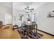 Casual dining area with a table and bench seating near windows at 8253 Abercrombe Way, Las Vegas, NV 89145