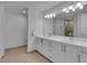 Modern bathroom with double vanity and large mirror at 4525 Dean Martin Dr # 3006, Las Vegas, NV 89103