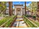 Community building entrance with landscaping at 104 Breezy Tree Ct # 103, Las Vegas, NV 89145