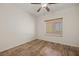 Bright bedroom with wood flooring and ceiling fan at 1318 Springdale Ln, Mesquite, NV 89034