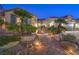 Landscaped front yard with a brick pathway and wrought iron gate at 2220 Canyonville Dr, Henderson, NV 89044