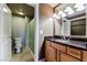 Clean bathroom with granite countertops and a shower at 230 E Flamingo Rd # 212, Las Vegas, NV 89169