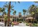 Resort-style pool with lounge chairs and cabanas at 230 E Flamingo Rd # 212, Las Vegas, NV 89169