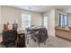 Small dining area with table and chairs, next to kitchen at 2657 Champagne Gold Ave, North Las Vegas, NV 89086