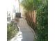 Landscaped walkway leading to the backyard at 3761 Tranquility Ridge Ct, Las Vegas, NV 89147