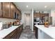 Modern kitchen with stainless steel appliances and white countertops at 3914 Weld Ave, Pahrump, NV 89061