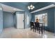 Bright entryway with dining area and view to kitchen at 5000 Red Rock St # 201, Las Vegas, NV 89118