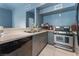 Modern kitchen featuring stainless steel appliances and quartz countertops at 5000 Red Rock St # 201, Las Vegas, NV 89118