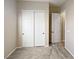 Bright bedroom with double door closet and neutral carpeting at 54 Barton Bay Ave, North Las Vegas, NV 89031