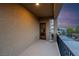 Balcony with door to bedroom and distant view at 6877 Painted Morning Ave, Las Vegas, NV 89142