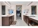 Double vanity bathroom with a view of the bedroom at 6877 Painted Morning Ave, Las Vegas, NV 89142