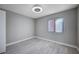 Simple bedroom with gray walls and flooring at 950 Seven Hills Dr # 2313, Henderson, NV 89052