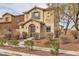 Two-story house with front yard landscaping and walkway at 10731 Mason Hill Ave, Las Vegas, NV 89166