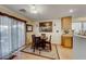 Bright dining area with a table and chairs, adjacent to the kitchen at 11734 Bergamo Ct, Las Vegas, NV 89183