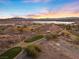 Lake and mountain views at sunset over golf course at 20 Via Visione # 104, Henderson, NV 89011