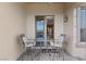 Private patio with table and chairs, offering scenic views at 20 Via Visione # 104, Henderson, NV 89011