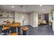 Modern lobby with wooden tables and stools at 200 W Sahara Ave # 3012, Las Vegas, NV 89102