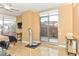 Bedroom with balcony access, a fitness machine, and tiled floors at 200 W Sahara Ave # 601, Las Vegas, NV 89102