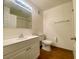 Clean bathroom with white vanity, toilet and shower/tub combo at 3842 Soda Springs Dr, Las Vegas, NV 89115