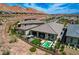 Single-story house with a private pool, outdoor kitchen, and mountain views at 41 Sun Mirage Ave, Henderson, NV 89011