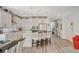 Modern kitchen with white cabinets, quartz countertops and island at 41 Sun Mirage Ave, Henderson, NV 89011